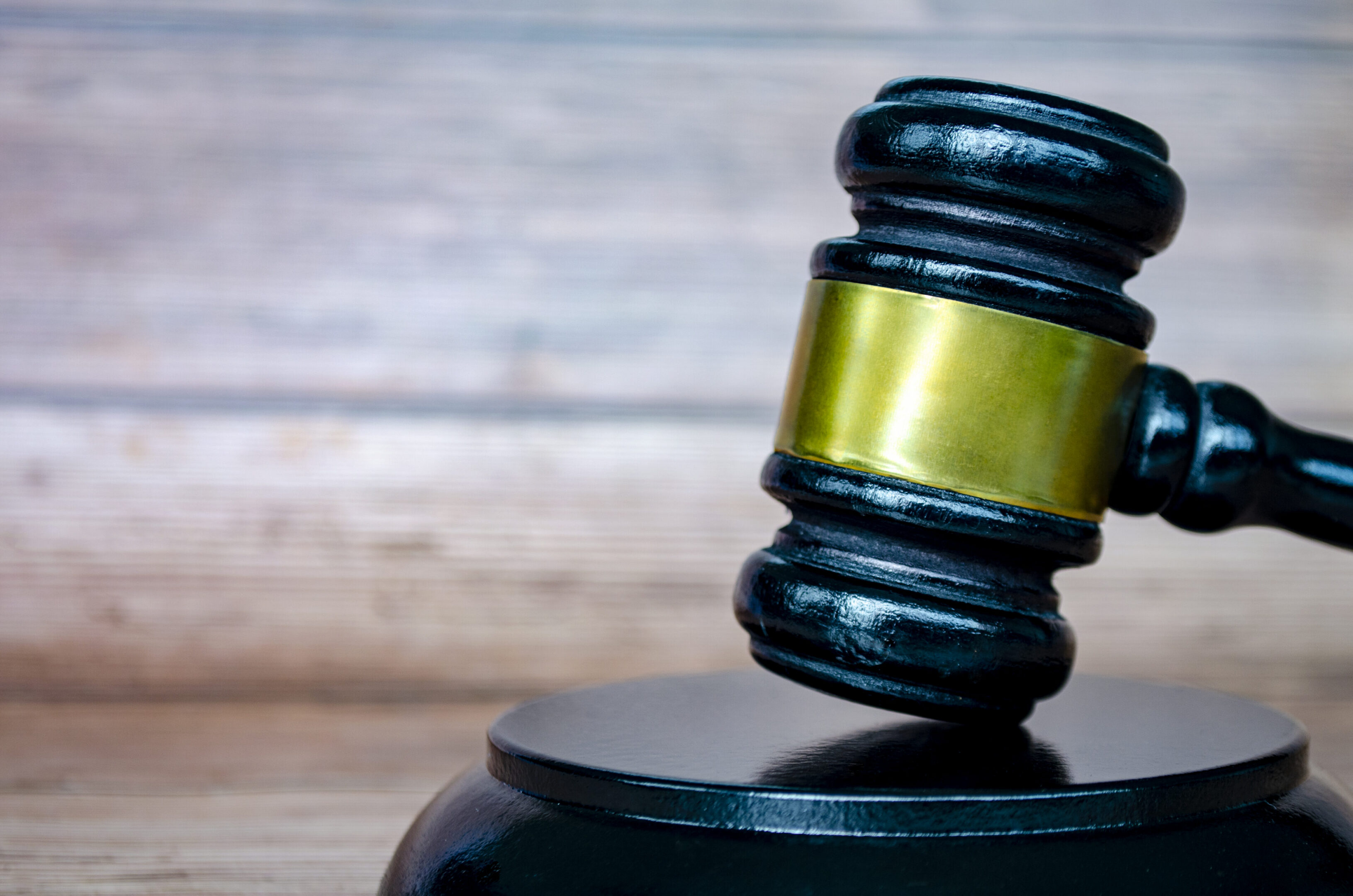 Courtroom gavel close-up on stand
