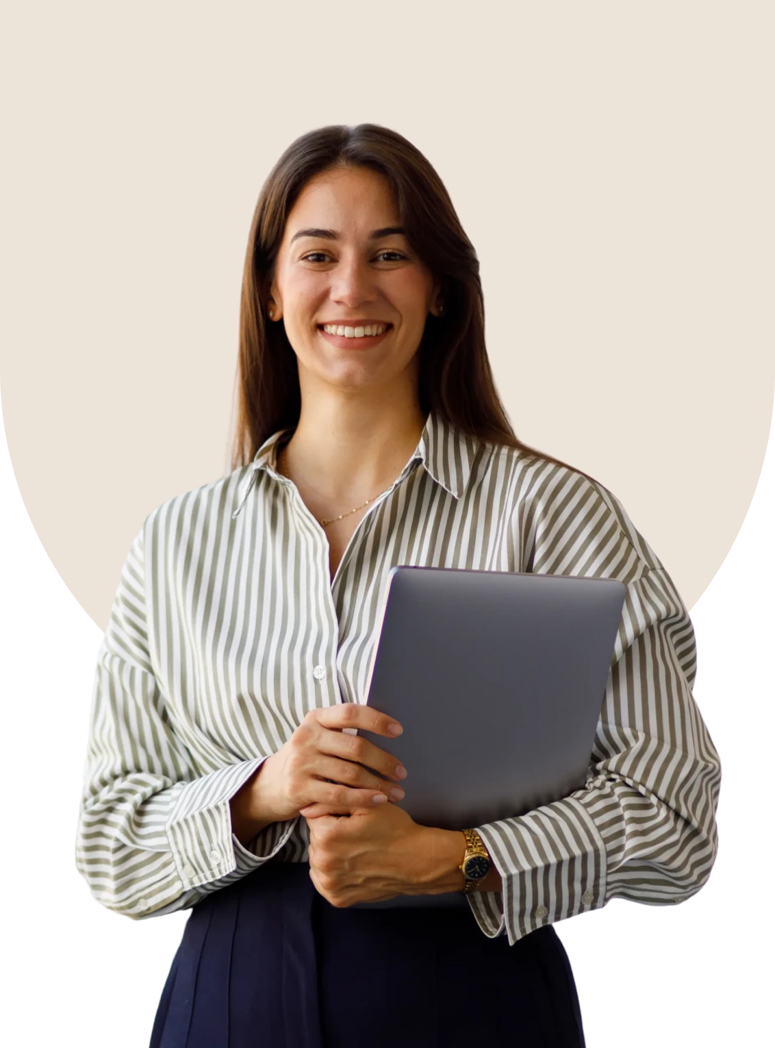 Woman in striped shirt holding laptop